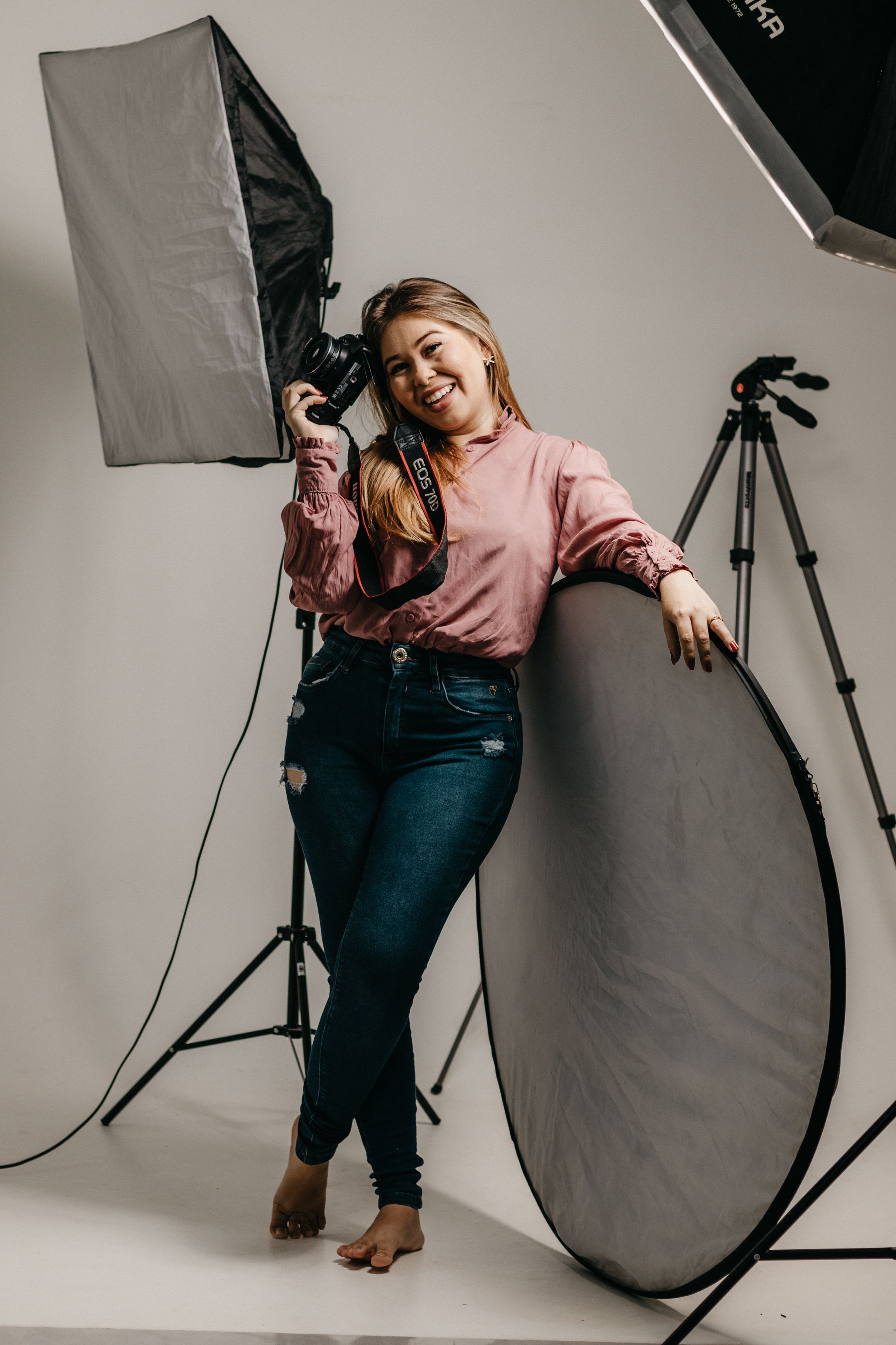 A photographer composing a studio image